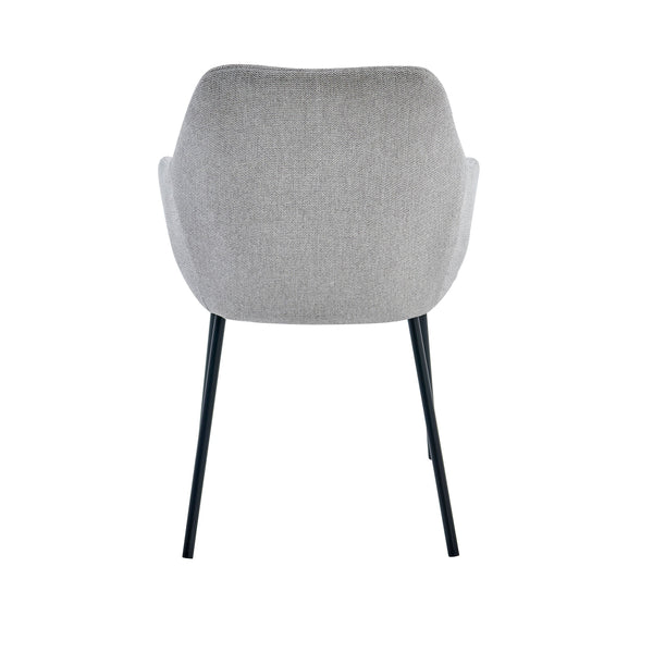 Grey upholstered dining chair back view with curved shell and black metal legs
