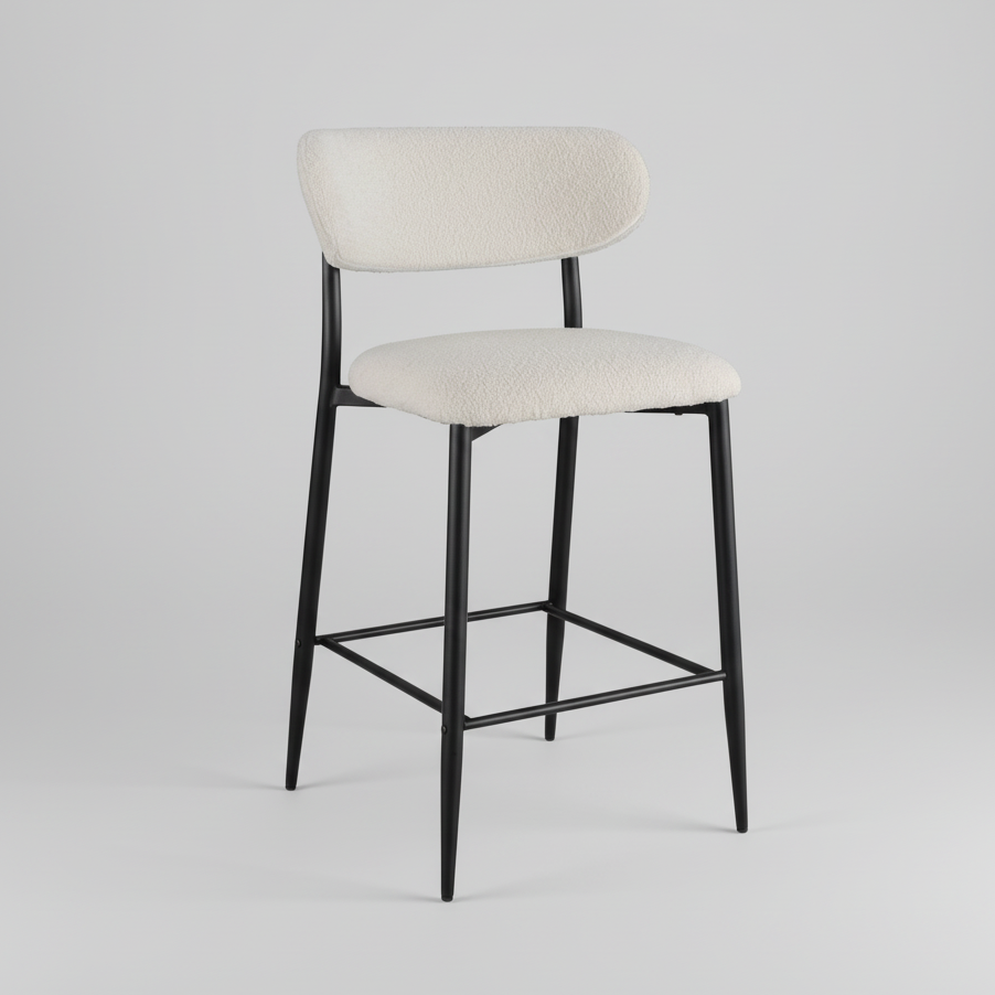 Bar stool front view with light beige upholstery, black metal frame and triangular footrest