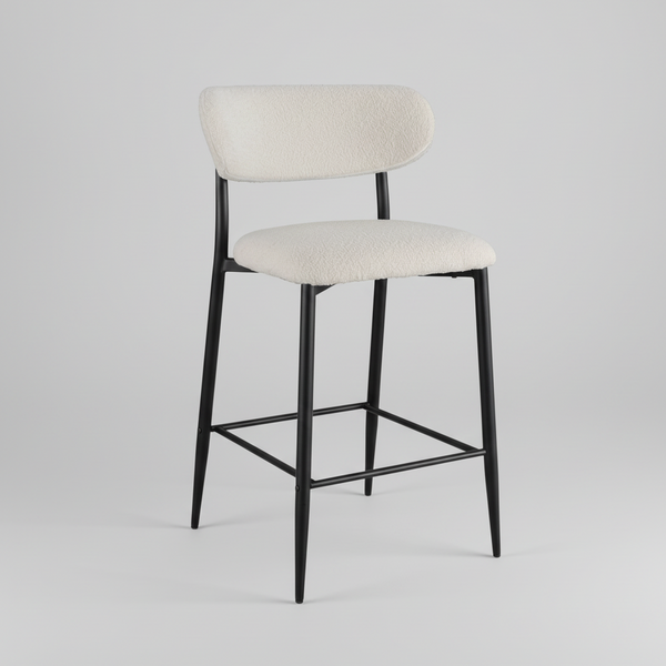 Bar stool front view with light beige upholstery, black metal frame and triangular footrest