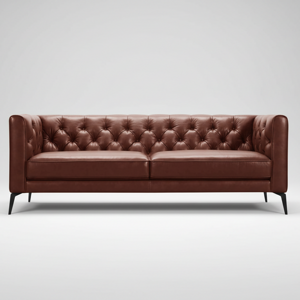 Brown leather Chesterfield sofa with deep button tufting and two-seat cushion base