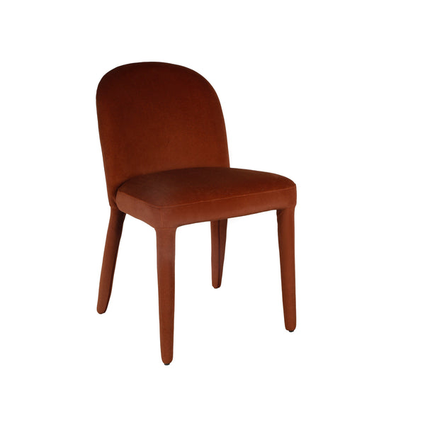 Rust upholstered dining chair with rounded back, padded seat, and tapered wooden legs