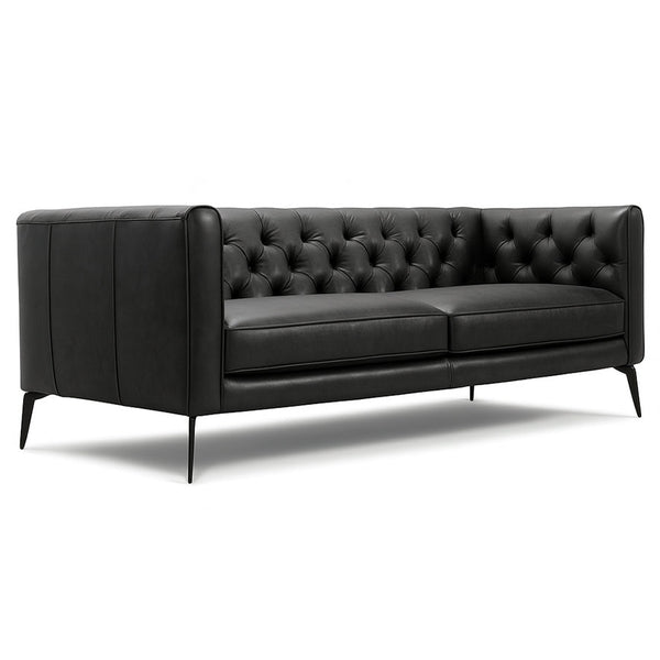 Black leather Chesterfield sofa with deep button-tufted back and low padded arms
