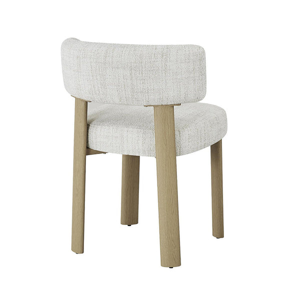 Dining chair with light mist grey fabric upholstery and rounded backrest