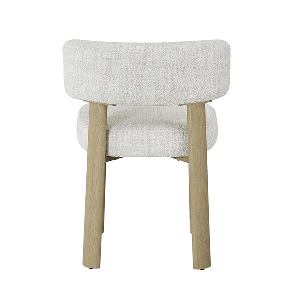 Dining chair with light mist grey upholstered seat and curved armrests