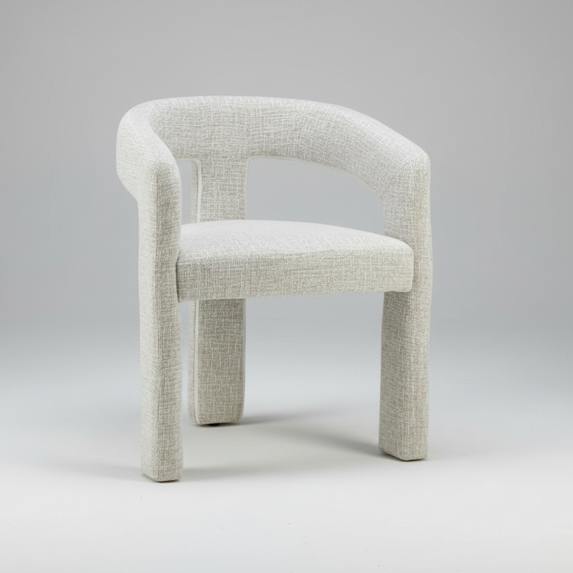 Light gray upholstered chair on a white background