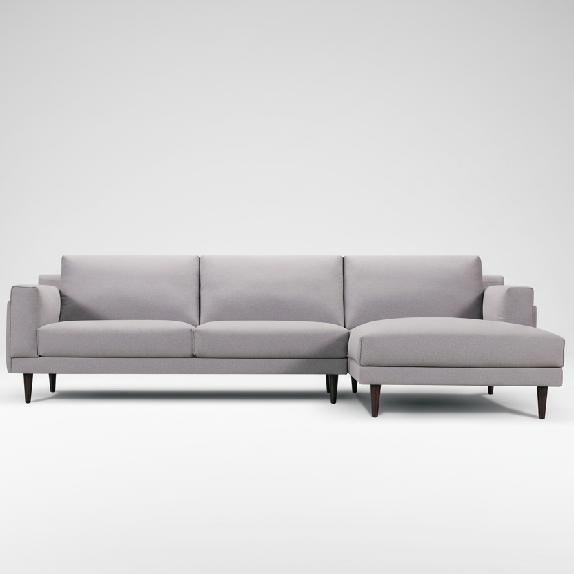 Light gray fabric chaise sectional sofa with three cushions and dark tapered legs.