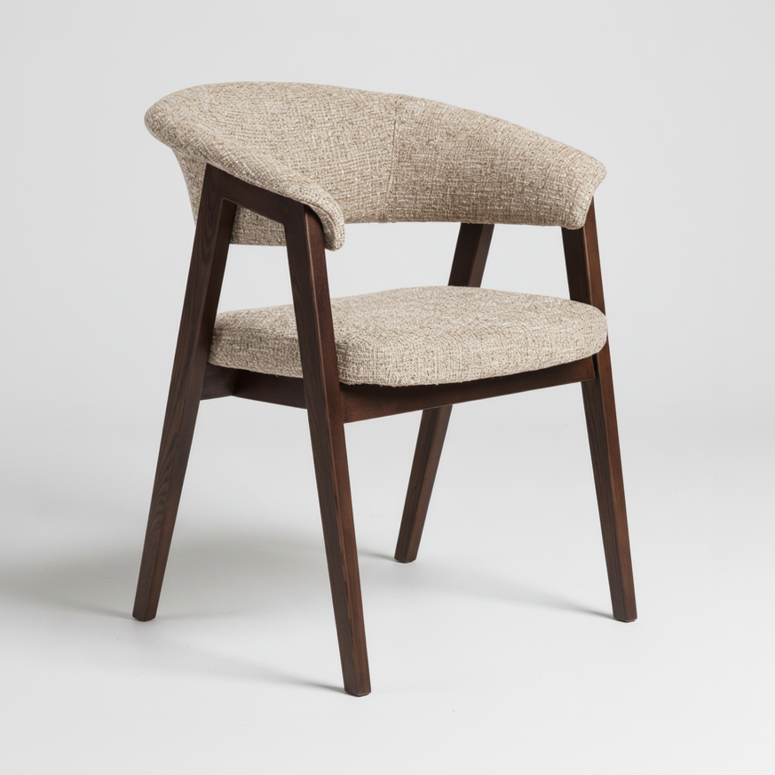 A mid-century modern accent chair with a curved upholstered backrest and seat cushion in a textured beige fabric, supported by dark brown wooden legs, shown on a light gray background.