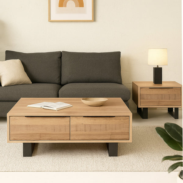 Light wood coffee table with two front drawers and dark legs