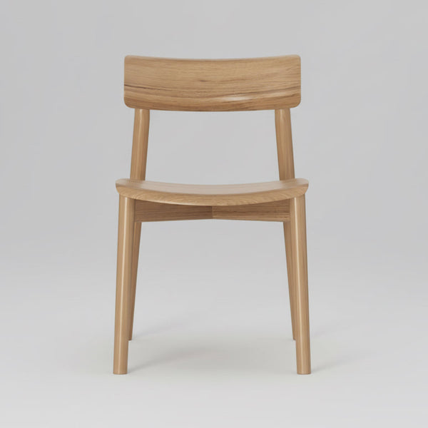 Wood dining chair with curved backrest and solid seat, straight legs