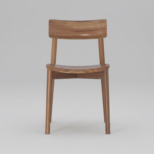 Wood dining chair with curved back and rounded seat, front view