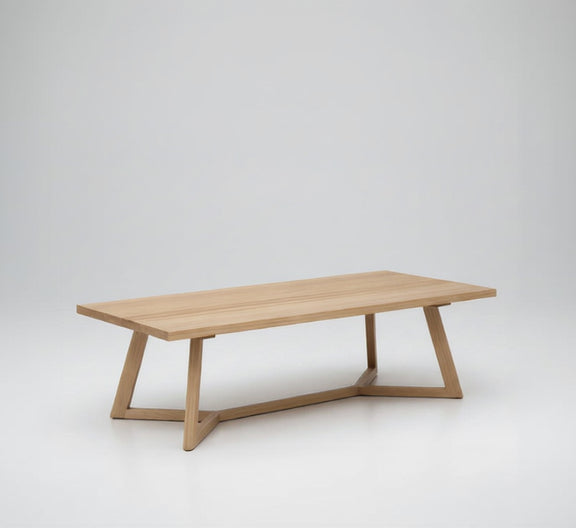 Light wood lamp table with rectangular top and two X-style side supports