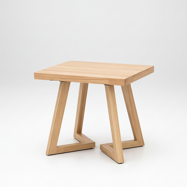 Light wood lamp table with square tabletop and chunky angled legs