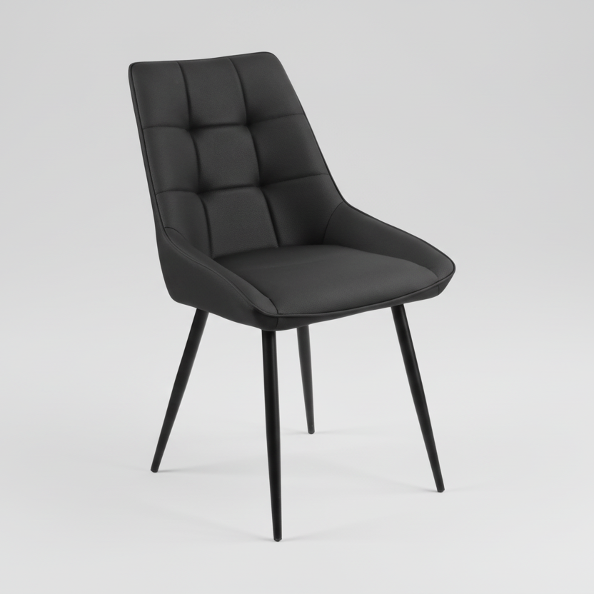 Black dining chair with tufted back and seat padding, curved arms, tapered angled legs