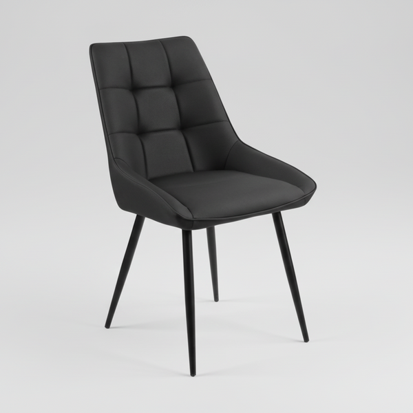 Black dining chair with tufted back and seat padding, curved arms, tapered angled legs