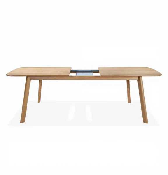 Light wood extendable dining table with central leaf insert