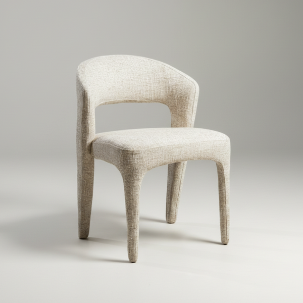 Wheat upholstered dining chair with textured fabric, curved arms, and four tapered legs