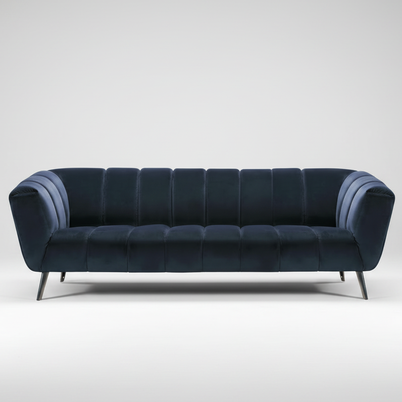 Tufted velvet sofa with rolled arms, dark blue upholstery, and tapered metal legs.