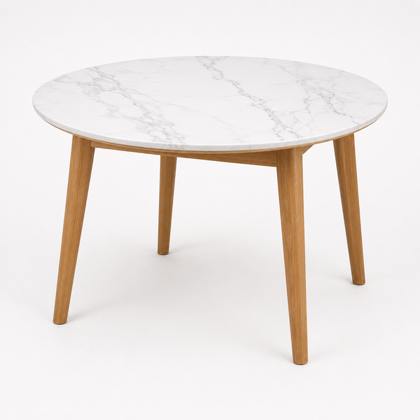 Round dining table with white marble-look top and four light wood legs
