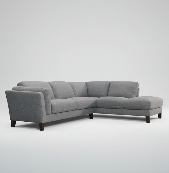Corner chaise sofa in dark grey fabric with boxy arms and low wooden legs