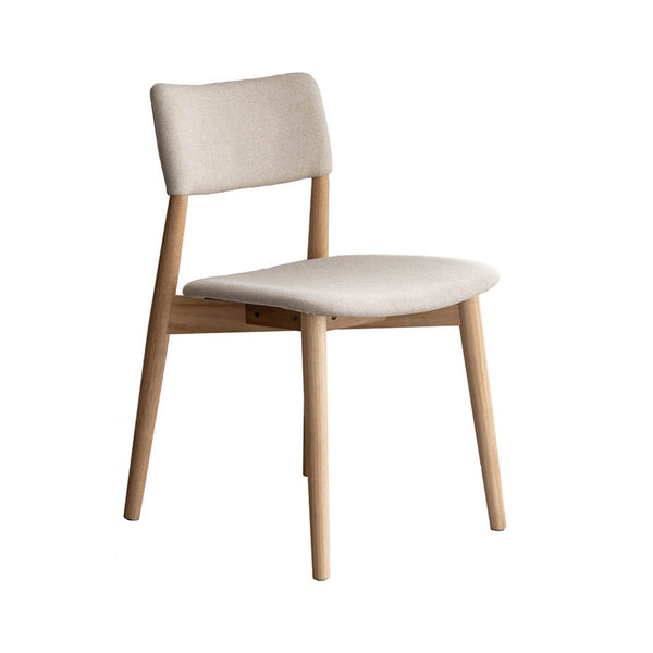 Dining chair with beige fabric seat and back, light wood legs, armless