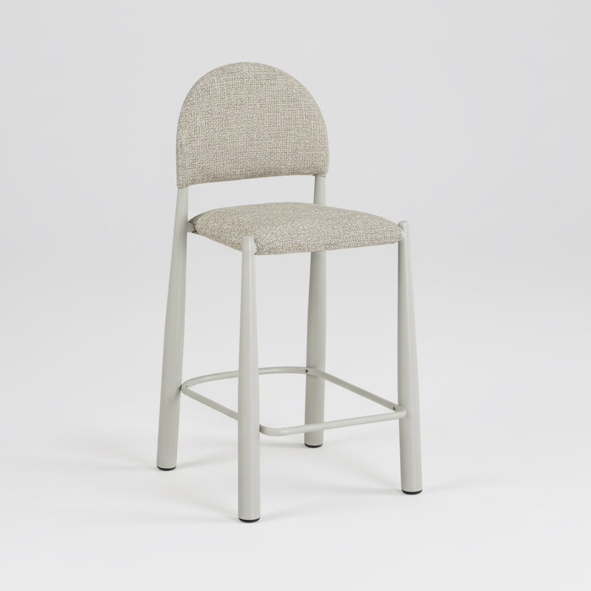 Beige bar stool with a white base on a light gray background