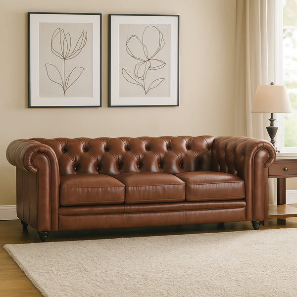 Brown leather Chesterfield sofa with tufted back, rolled arms, and nailhead trim