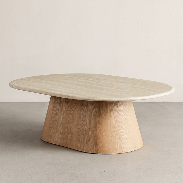 Light wood oval accent coffee table with flared pedestal base