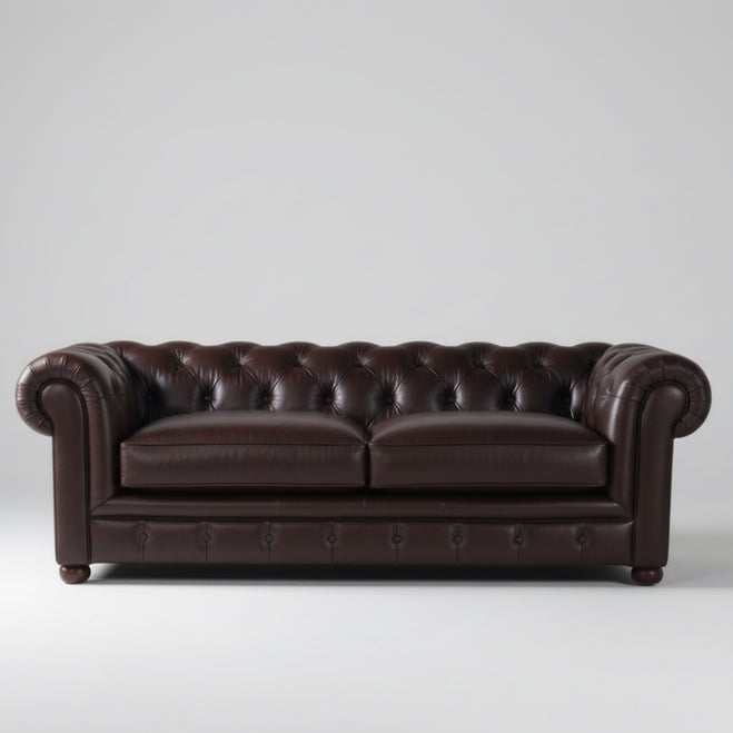 Dark brown leather Chesterfield sofa with deep tufting, two-seat style and rolled arms