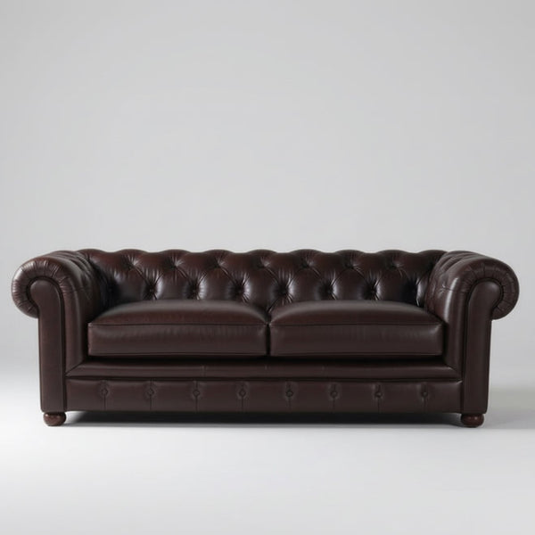 Dark brown leather Chesterfield sofa with deep tufting, two-seat style and rolled arms