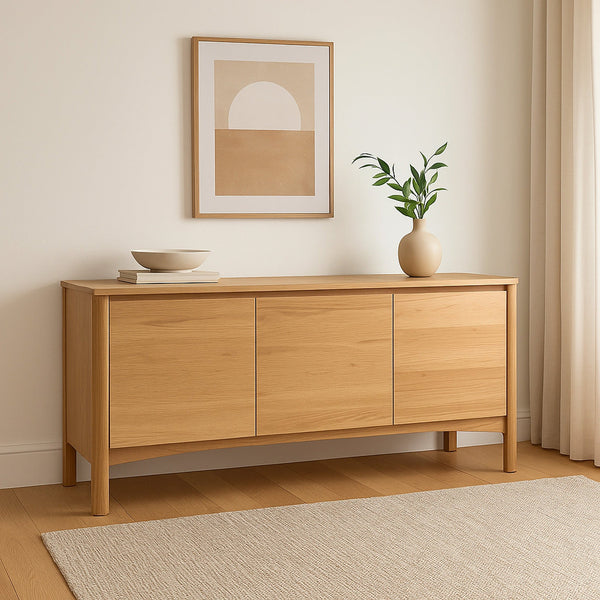 Wood-toned buffet cabinet with three doors, open base, and tapered legs