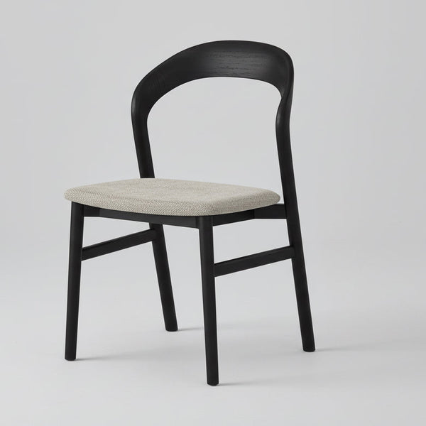 Black willow dining chair with light beige fabric seat