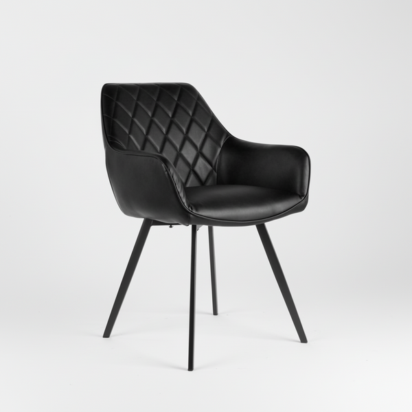 Black dining chair with diamond-quilted back and molded seat, four legs