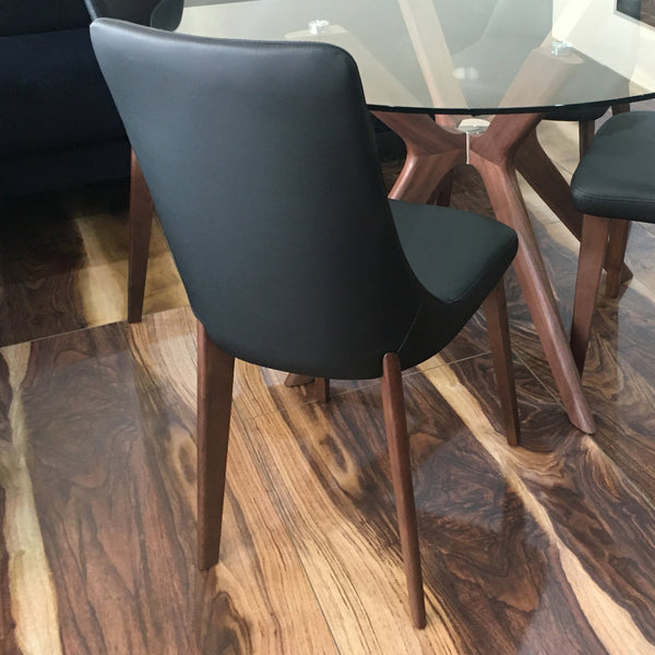 Cayman dining setting walnut with black chairs close up
